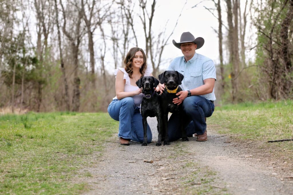 Couple With Two Dogs